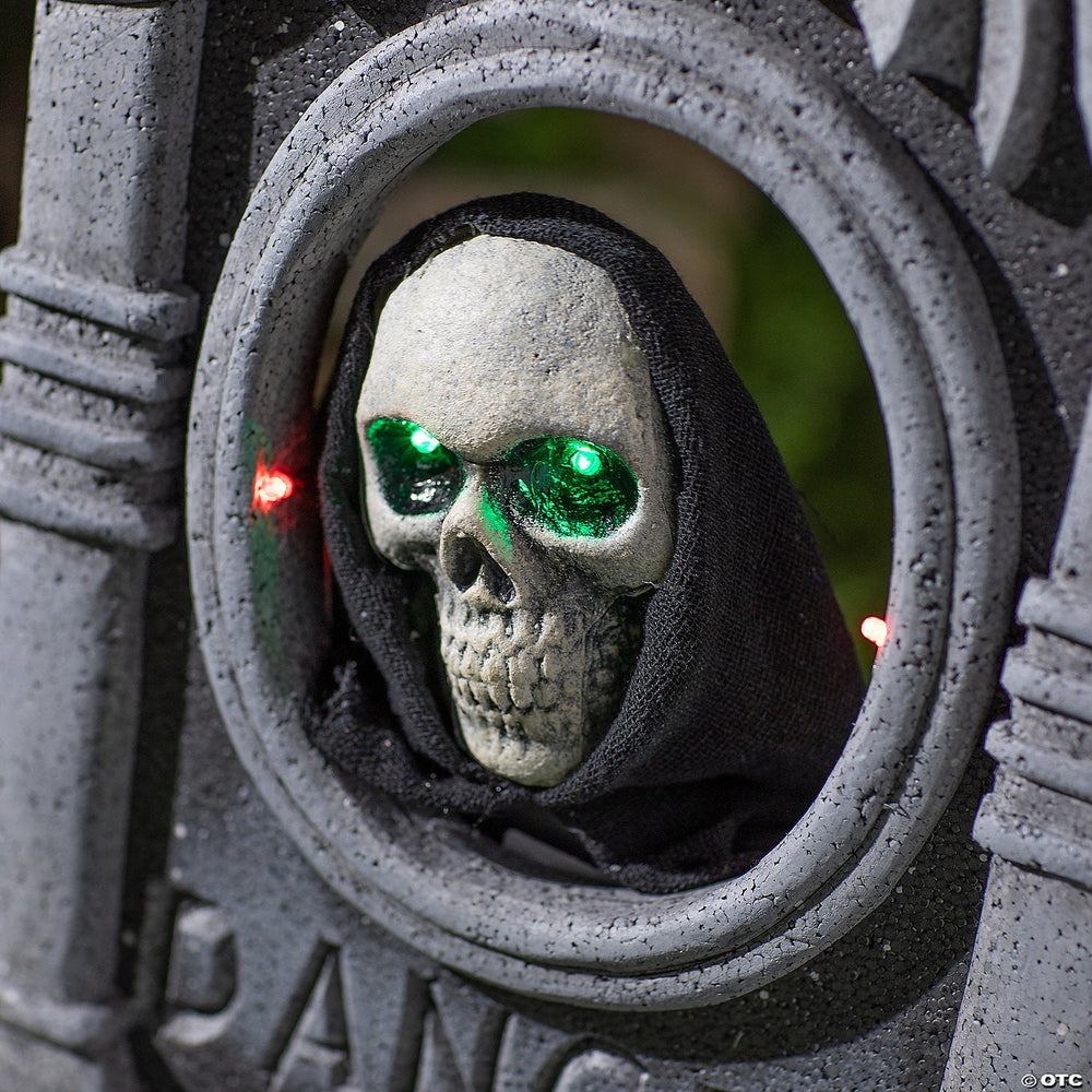 22” Gray Tombstone with Light-Up Moving Skeleton Head Halloween Decoration